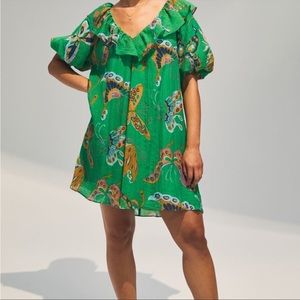 Beautiful green dress with butterflies. New with tags. H&M size small.